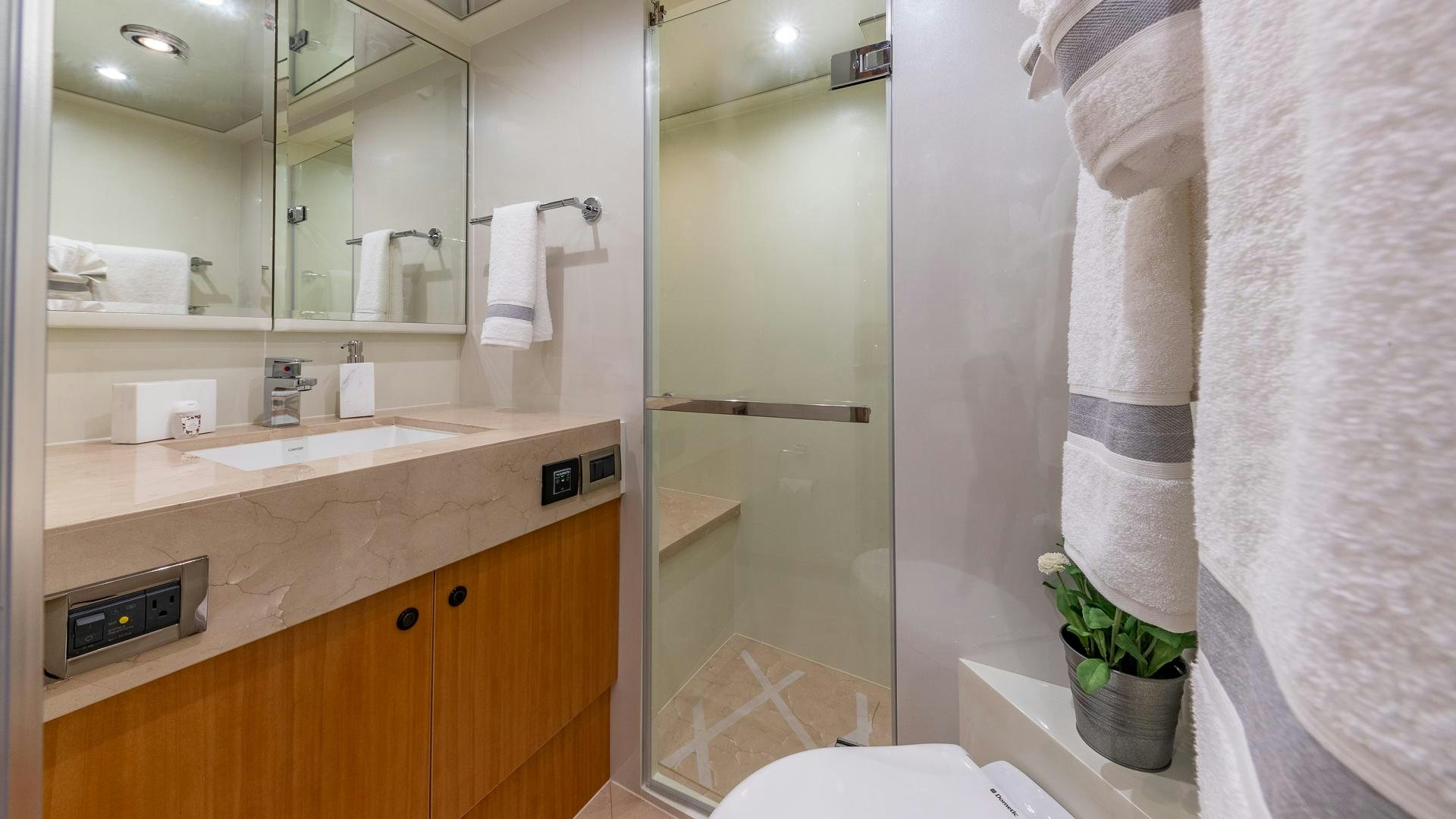 a bathroom with a sink and a toilet aboard LIFE FOR SALE Yacht for Sale