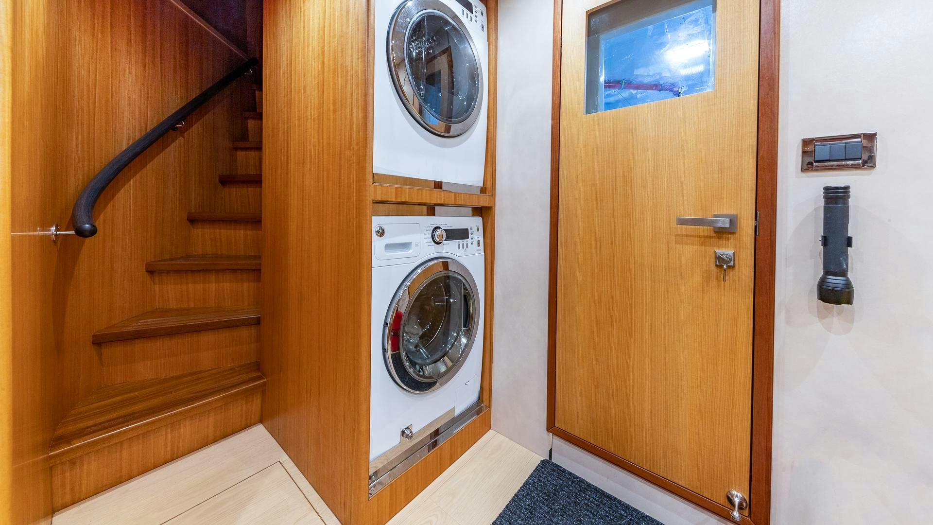 a washer and dryer in a room aboard LIFE FOR SALE Yacht for Sale