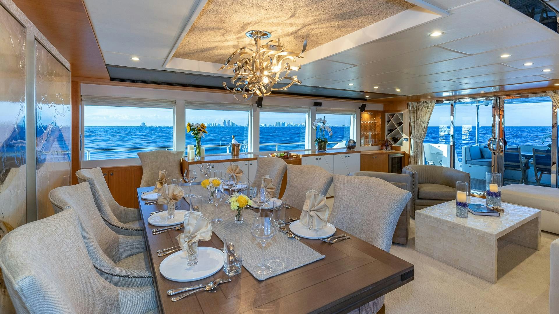 a large room with a table and chairs aboard LIFE FOR SALE Yacht for Sale