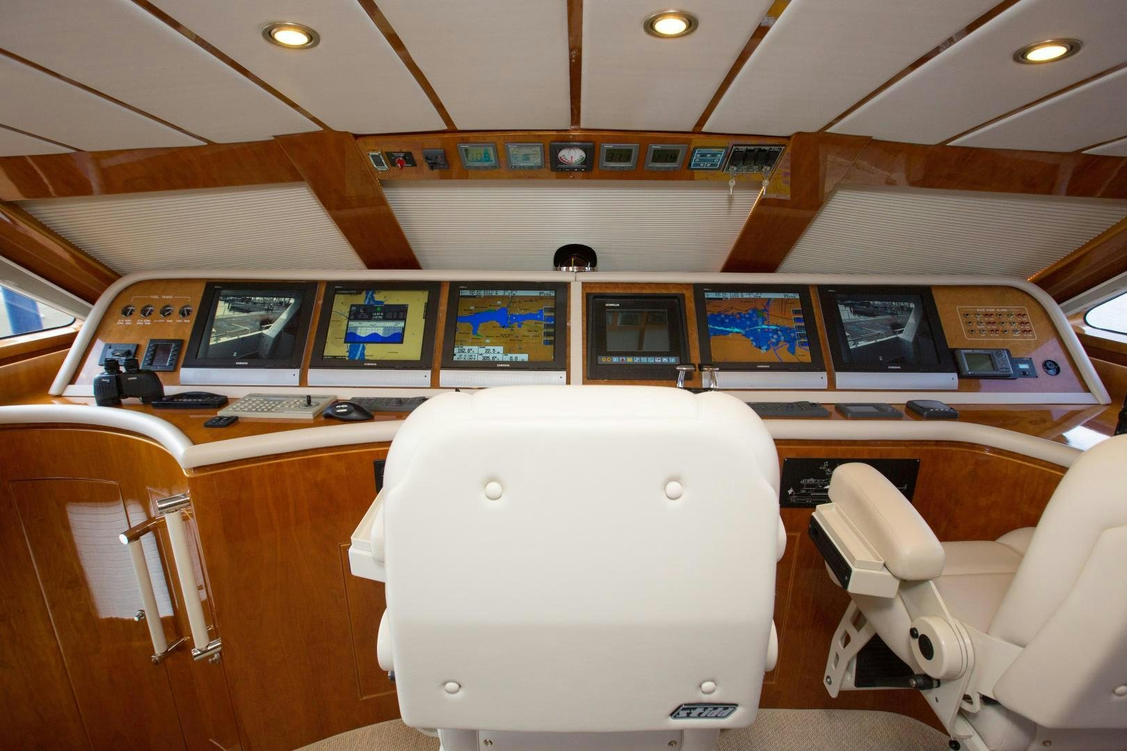 a room with a large white chair and a large white object on the wall aboard STERLING V Yacht for Sale