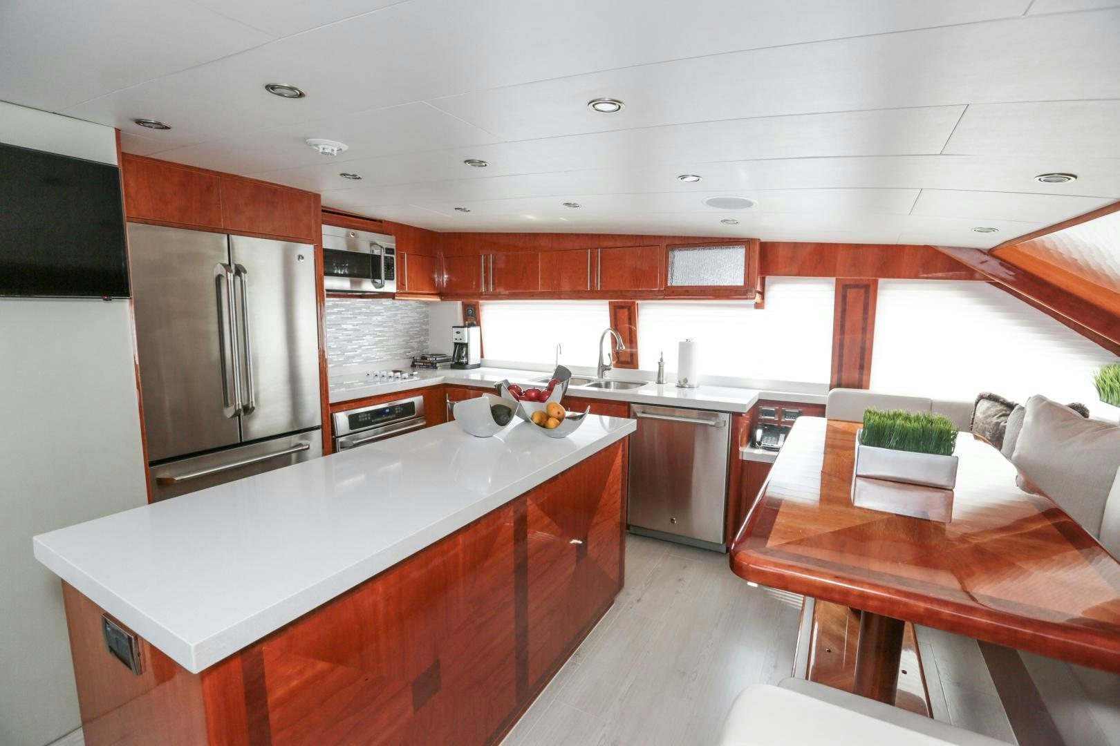 a kitchen with a large island aboard STERLING V Yacht for Sale