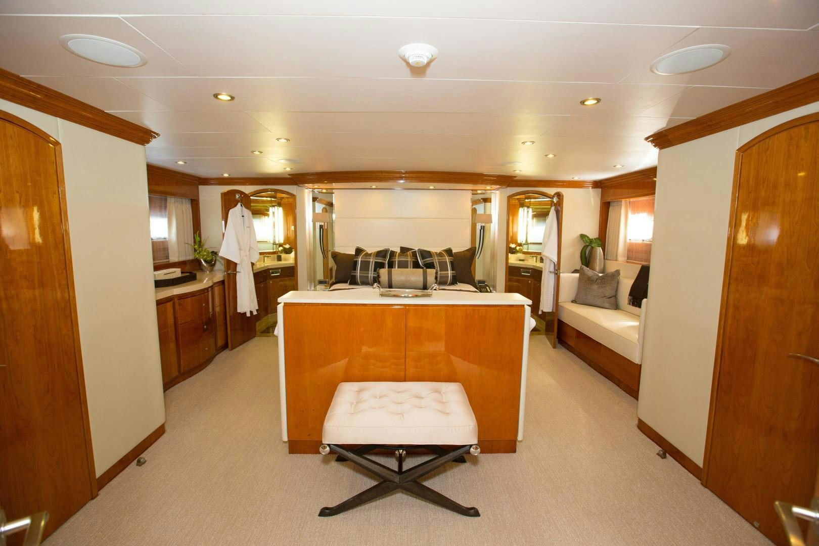 a room with a table and chairs aboard STERLING V Yacht for Sale