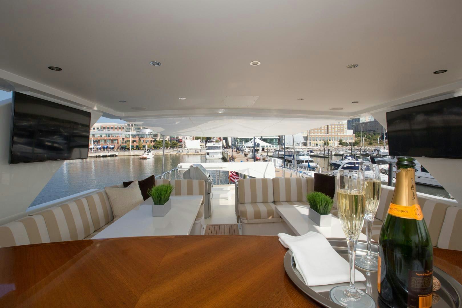 a glass bottle on a table aboard STERLING V Yacht for Sale