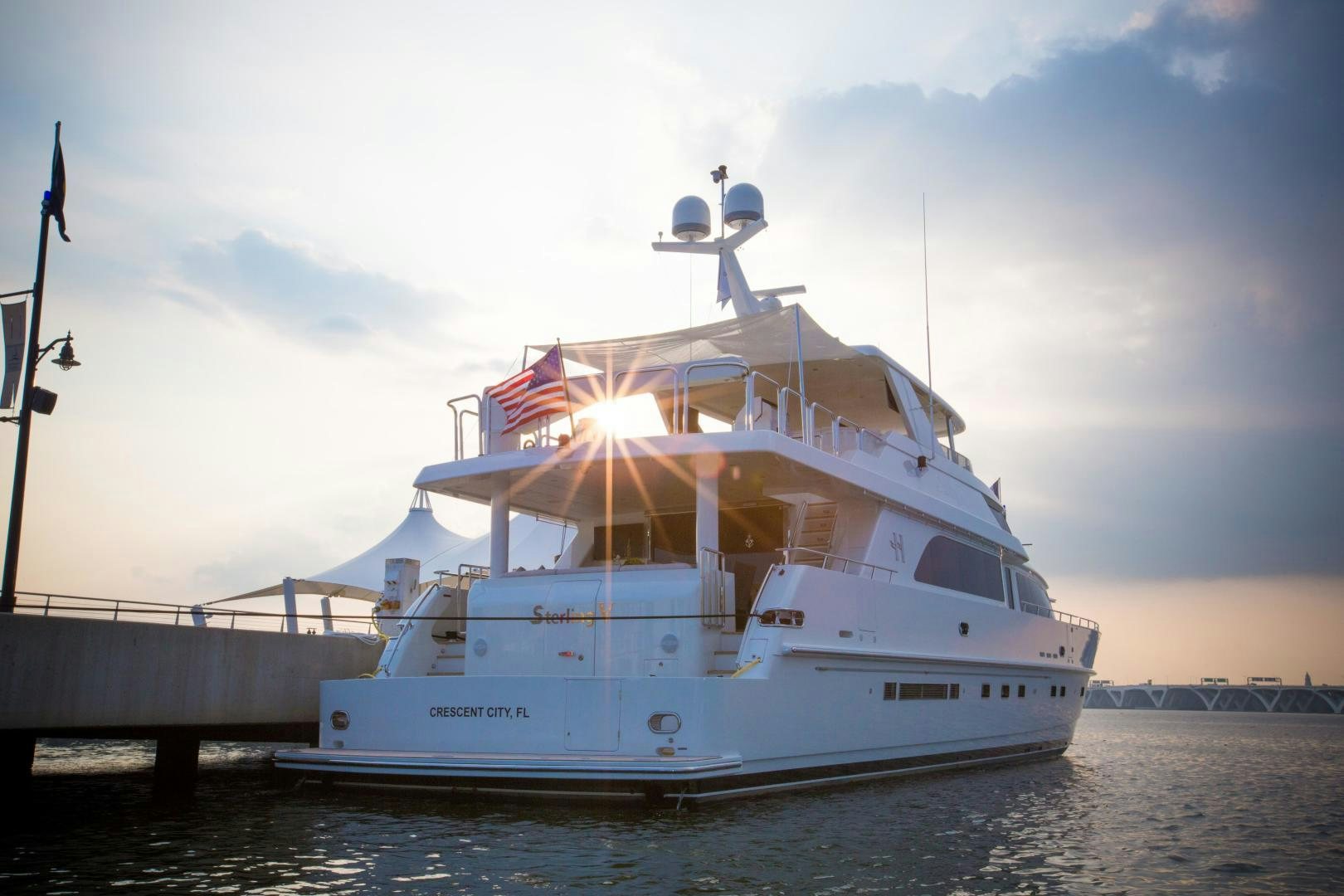 a large white boat on the water aboard STERLING V Yacht for Sale
