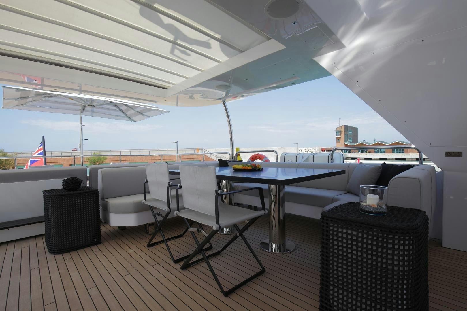 a room with a table and chairs aboard NOVASTAR Yacht for Sale