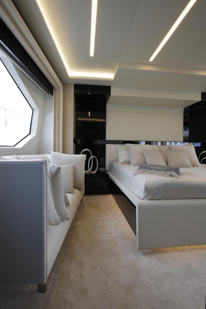 a room with two beds aboard NOVASTAR Yacht for Sale