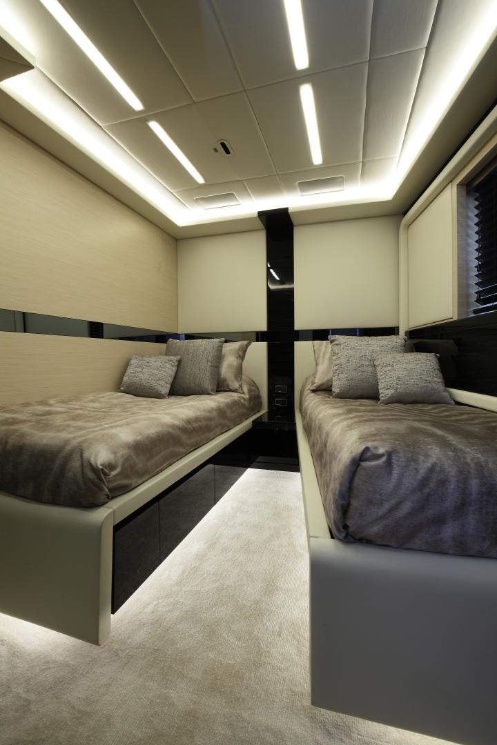 a room with two beds aboard NOVASTAR Yacht for Sale