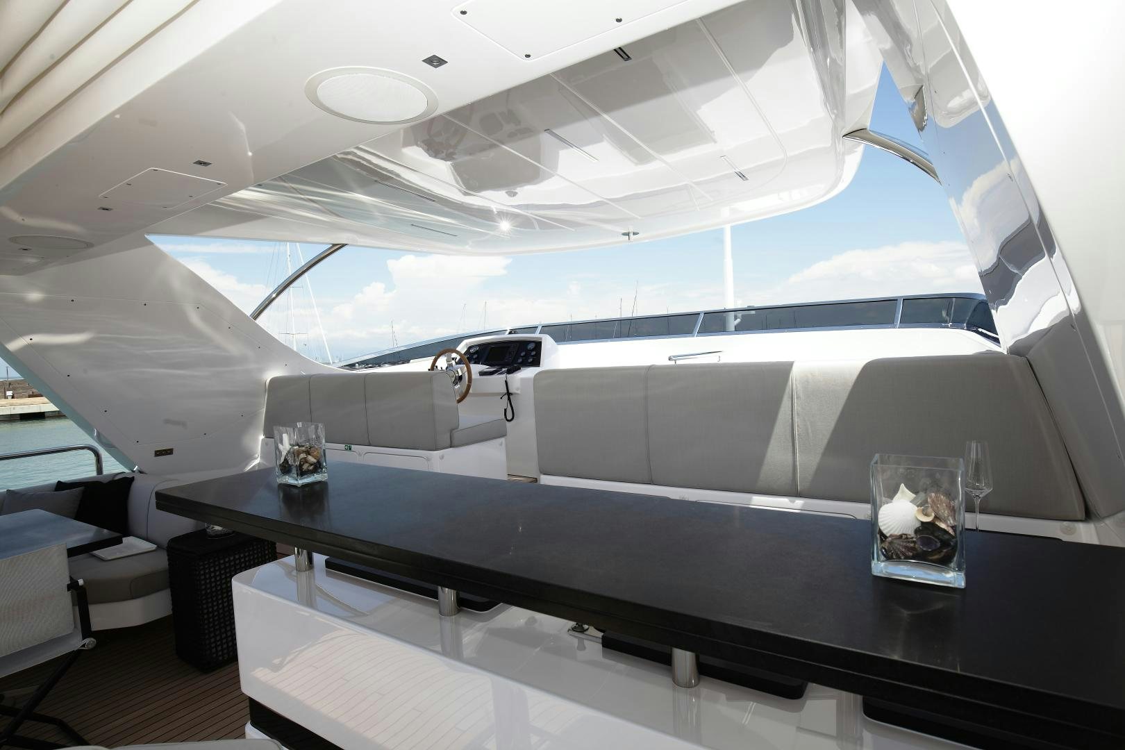 a space ship with a glass table aboard NOVASTAR Yacht for Sale