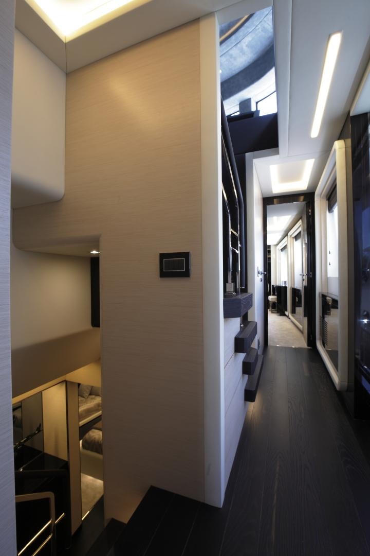 a hallway with a glass door aboard NOVASTAR Yacht for Sale