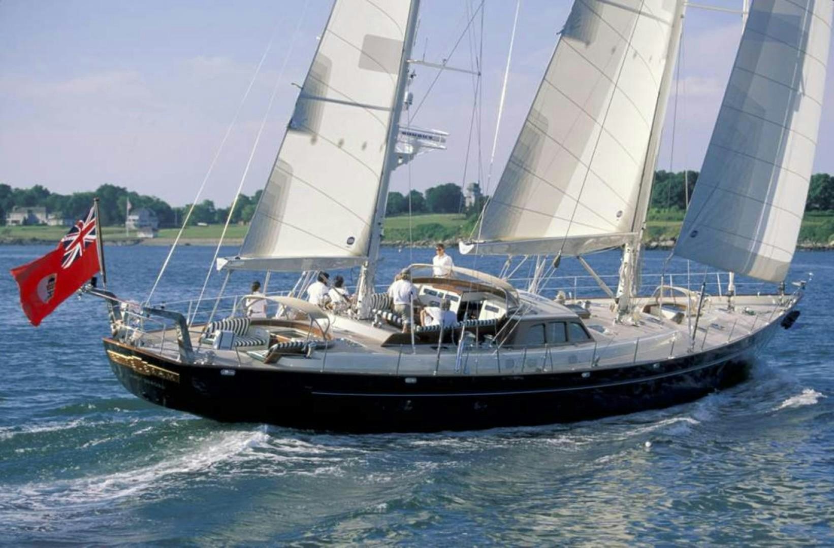 a boat with a flag on it aboard CARMELLA  Yacht for Sale