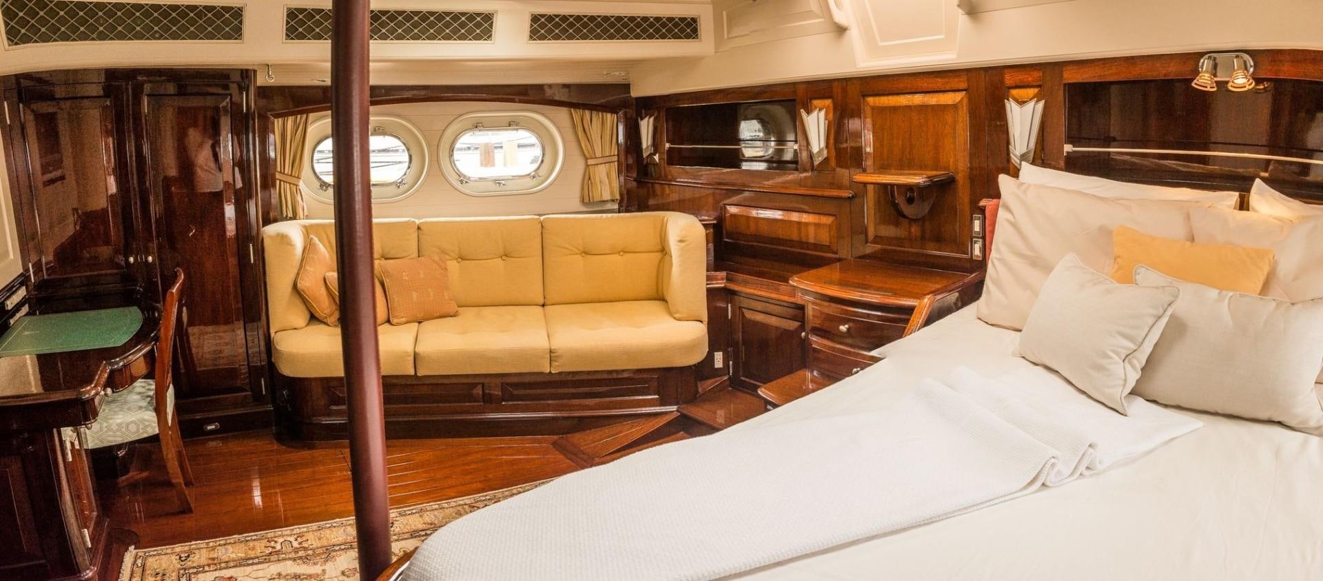 a bed in a room aboard CARMELLA  Yacht for Sale
