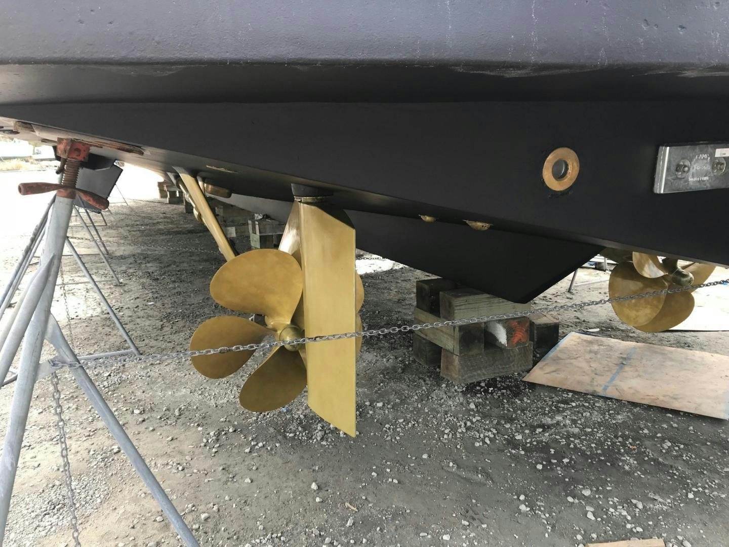 a car with a couple of bolts aboard DEAL MAKER Yacht for Sale