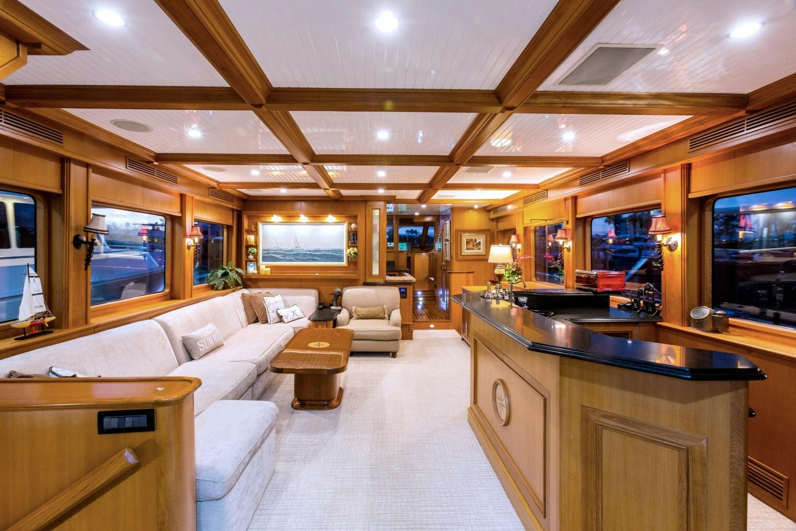 a large kitchen and living room aboard DEAL MAKER Yacht for Sale