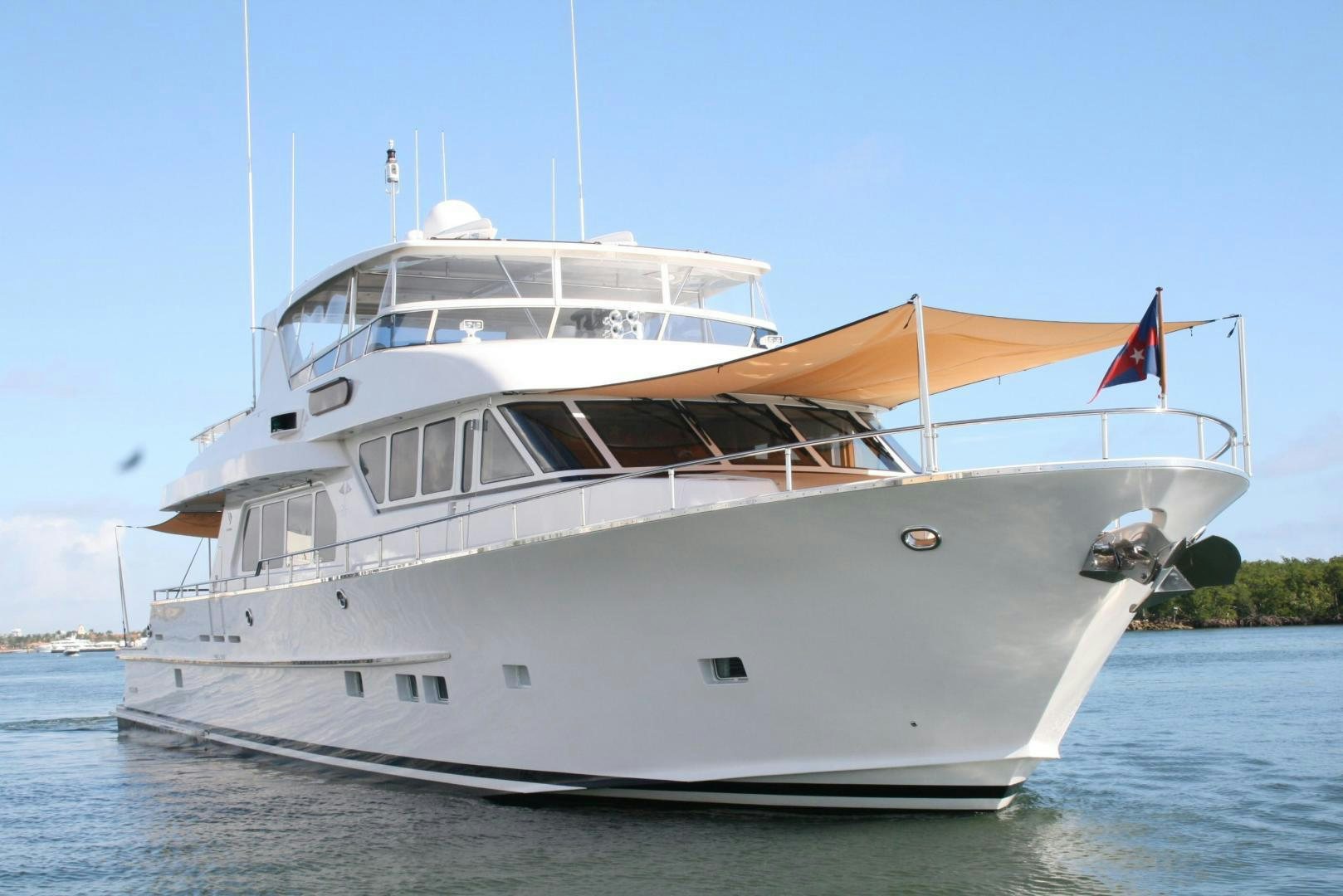 a large white boat aboard DEAL MAKER Yacht for Sale