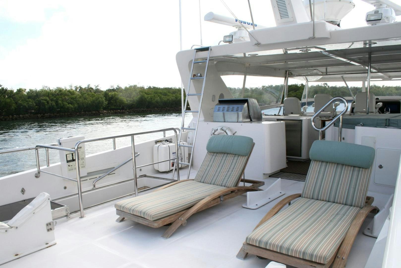 a boat on a deck aboard DEAL MAKER Yacht for Sale