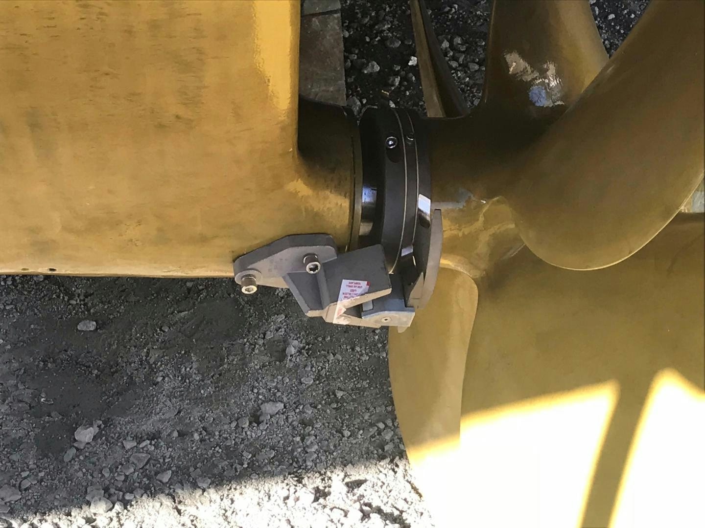 a black and silver gun aboard DEAL MAKER Yacht for Sale