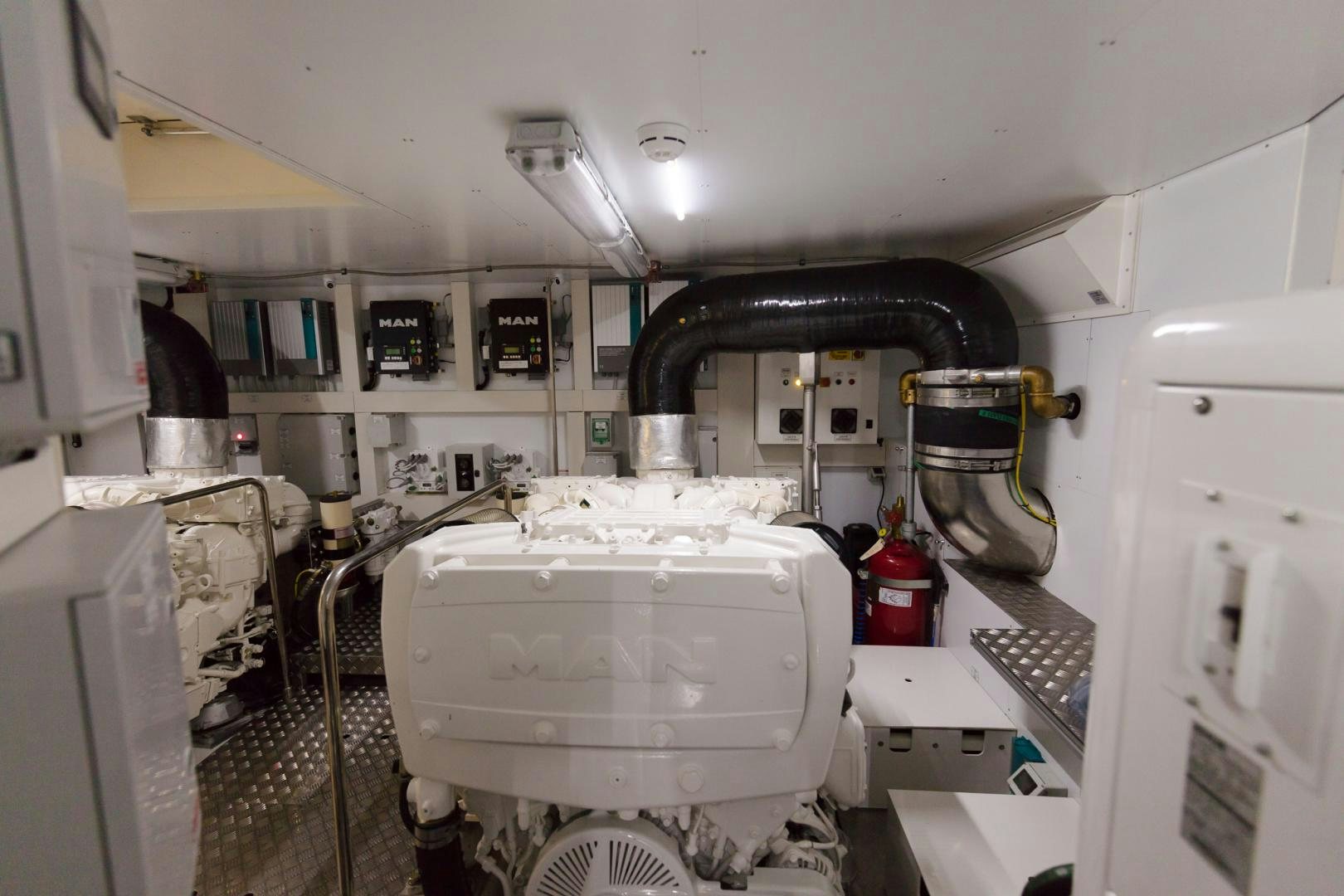 a large machine in a room aboard BONUS ROUND Yacht for Sale