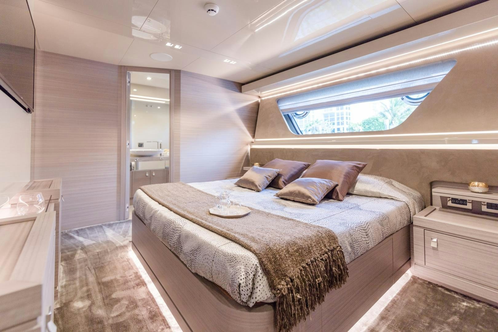 a bed in a room aboard BONUS ROUND Yacht for Sale