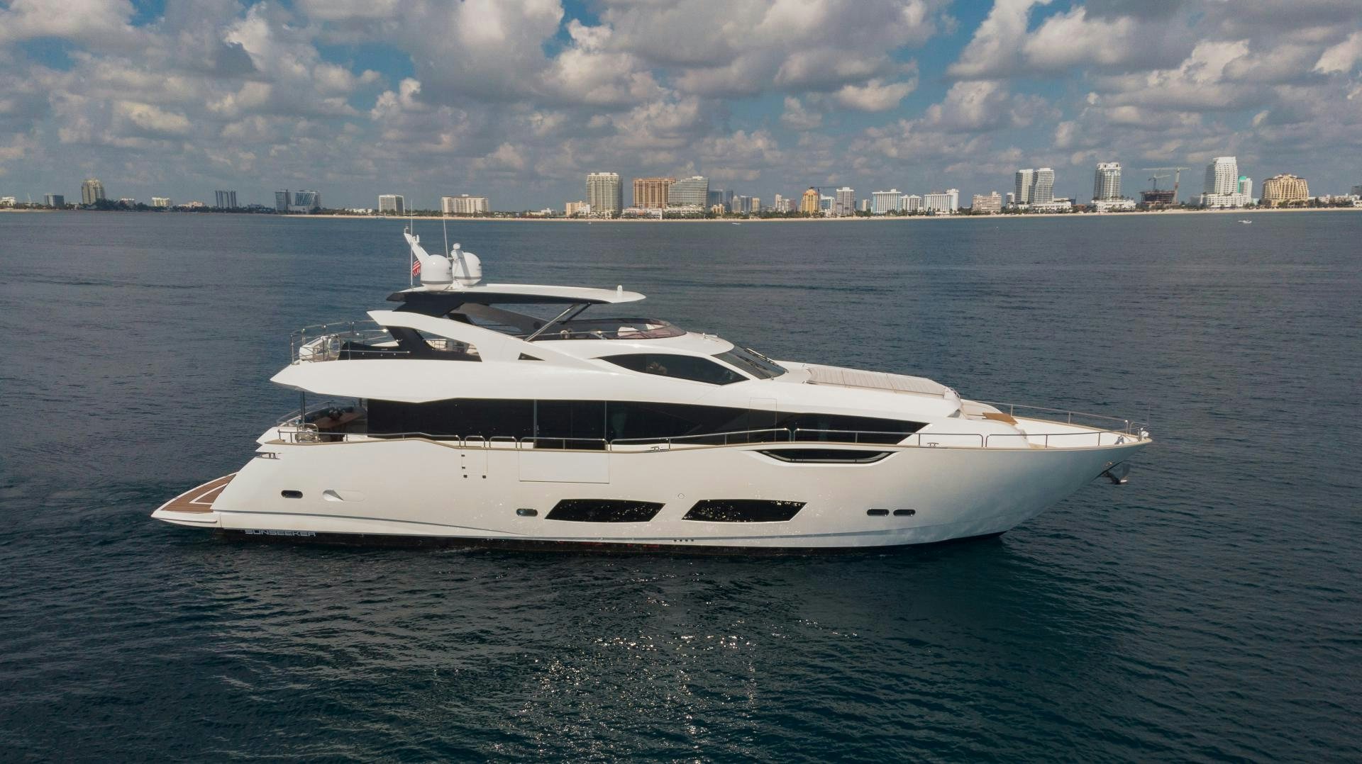 a white yacht in the water aboard PV 95 Yacht for Sale