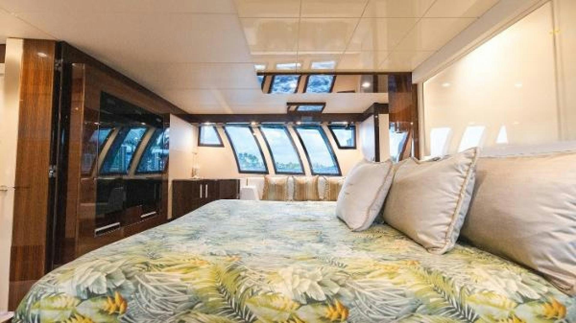 a bed with pillows aboard Z Yacht for Sale