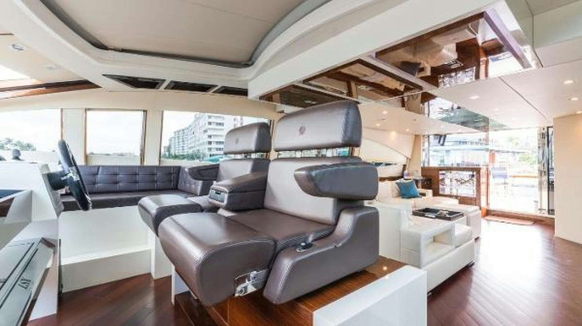 a room with a couch and a table aboard Z Yacht for Sale