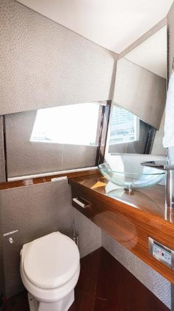 a bathroom with a glass shower aboard Z Yacht for Sale