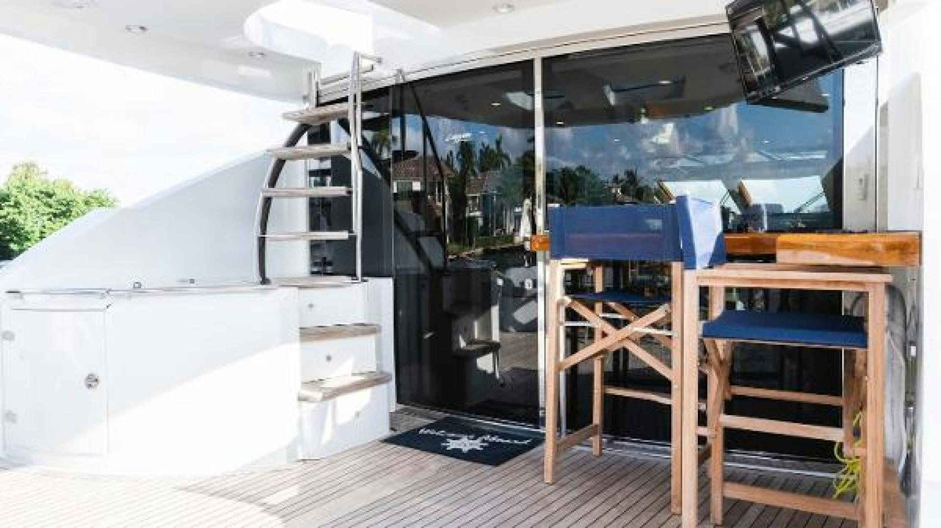 a room with a bunk bed and a desk aboard Z Yacht for Sale