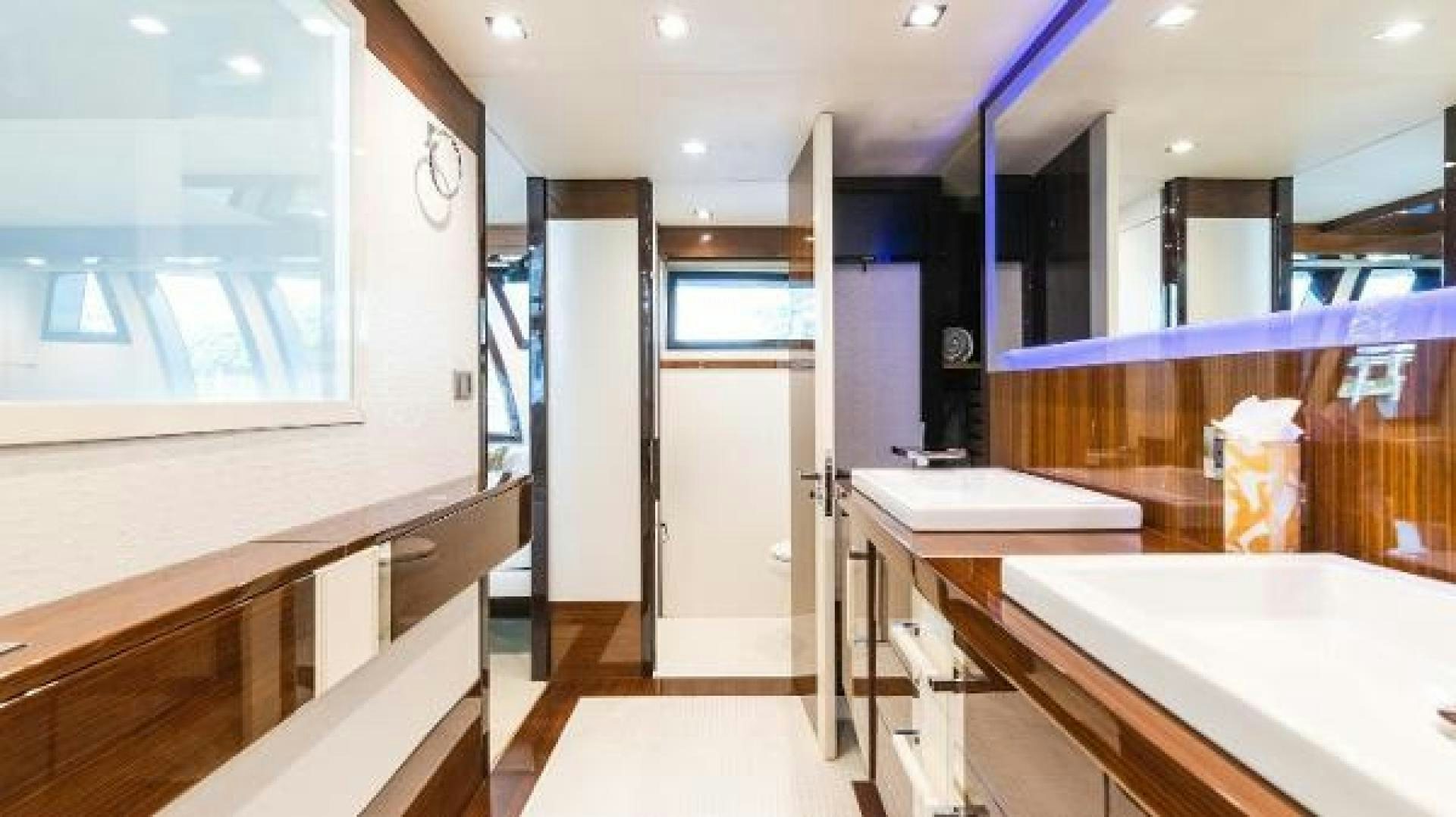a room with countertop sinks and cabinets aboard Z Yacht for Sale