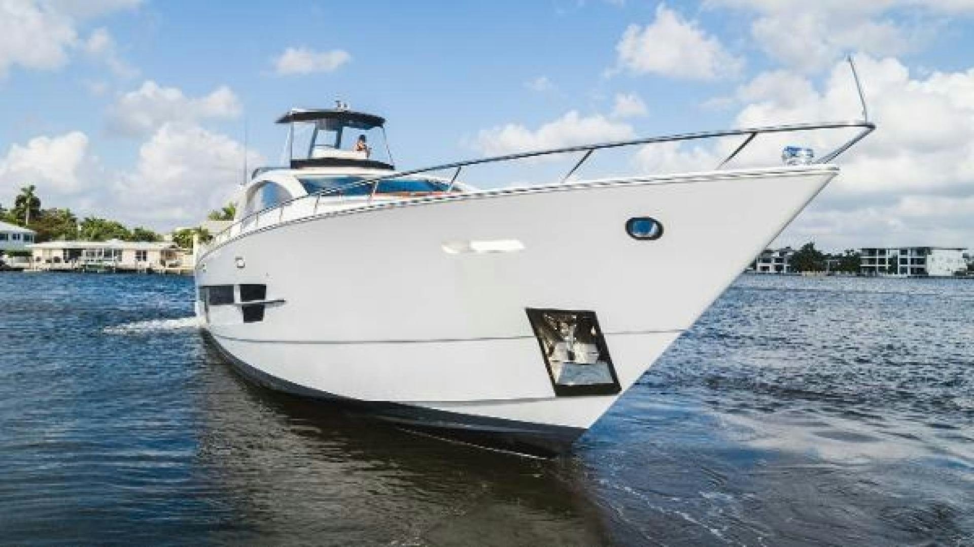 a white boat on the water aboard Z Yacht for Sale
