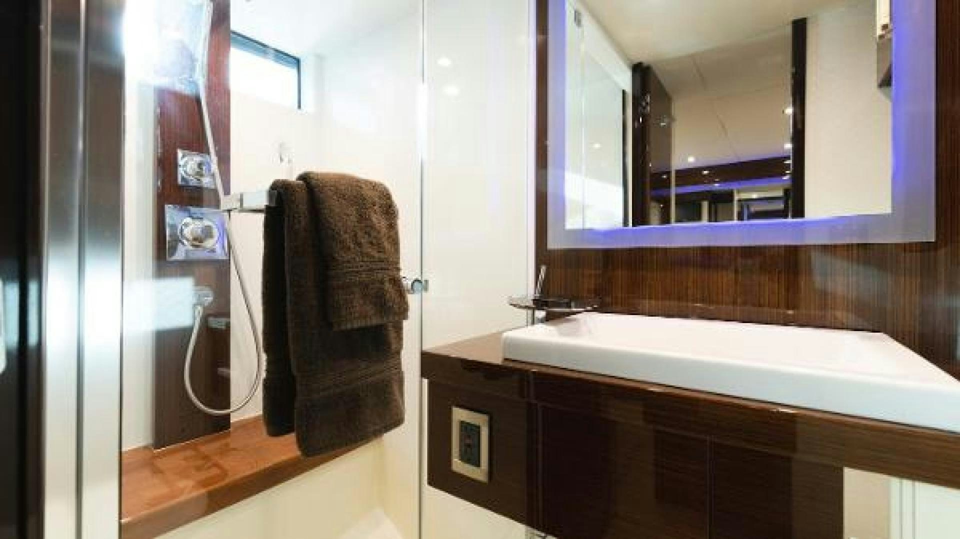 a bathroom with a towel on the wall aboard Z Yacht for Sale