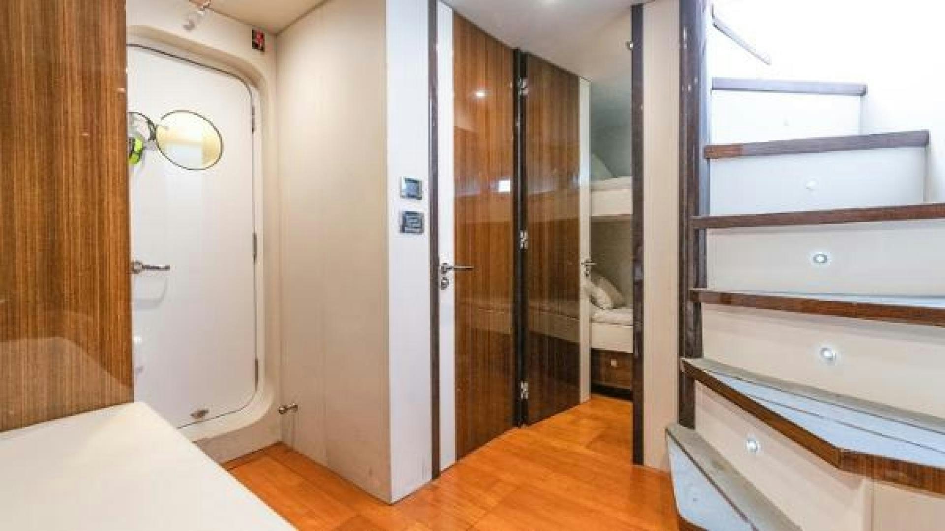 a room with a closet and a bed aboard Z Yacht for Sale