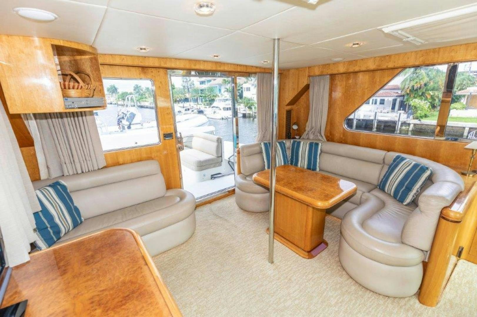 a living room with a couch and a table aboard BELISARIUS Yacht for Sale