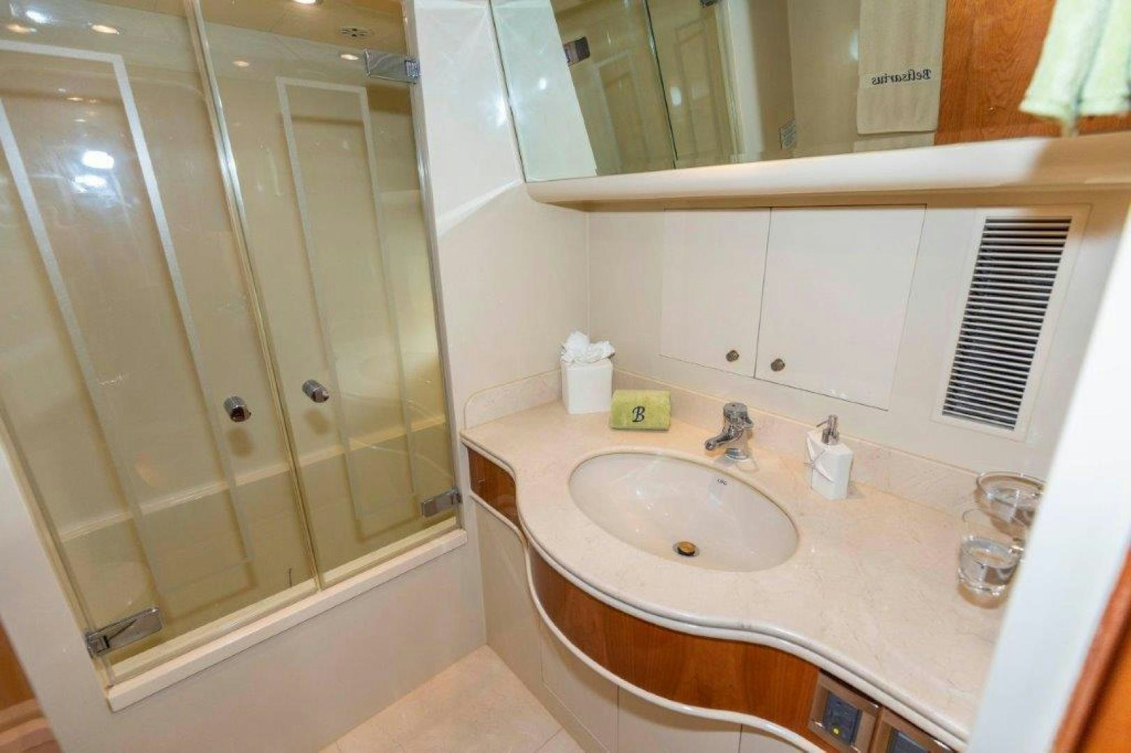 a bathroom with a sink and shower aboard BELISARIUS Yacht for Sale