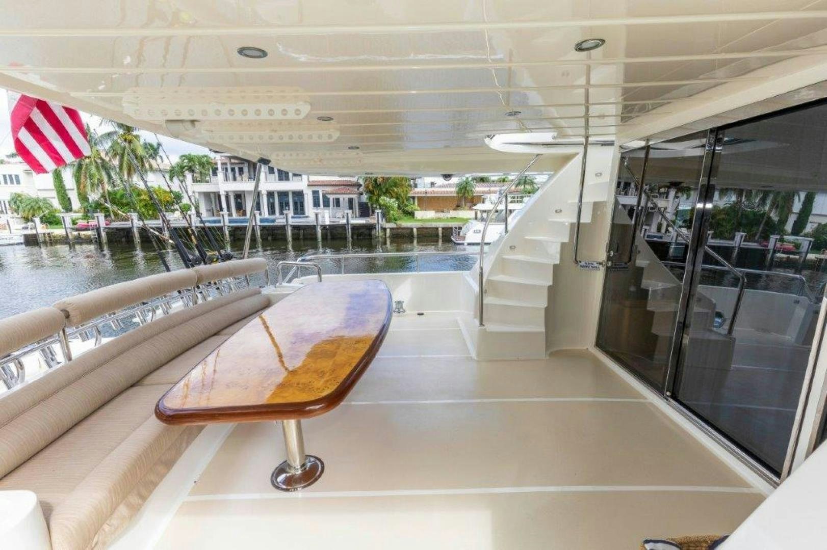 a room with a table and chairs aboard BELISARIUS Yacht for Sale
