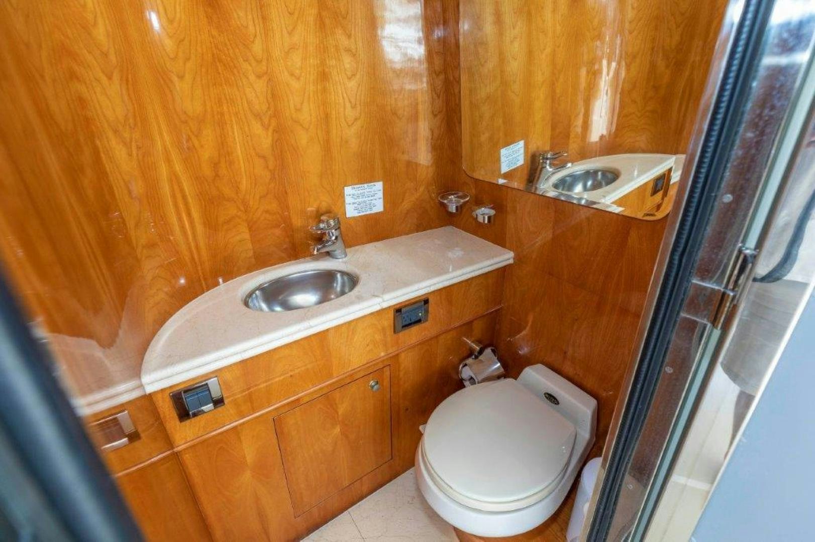 a bathroom with a sink and toilet aboard BELISARIUS Yacht for Sale