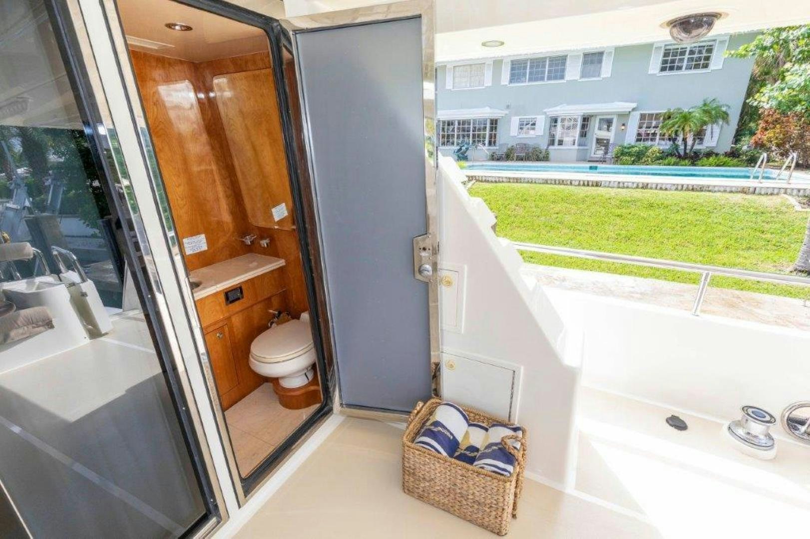 a bathroom with a tub and toilet aboard BELISARIUS Yacht for Sale
