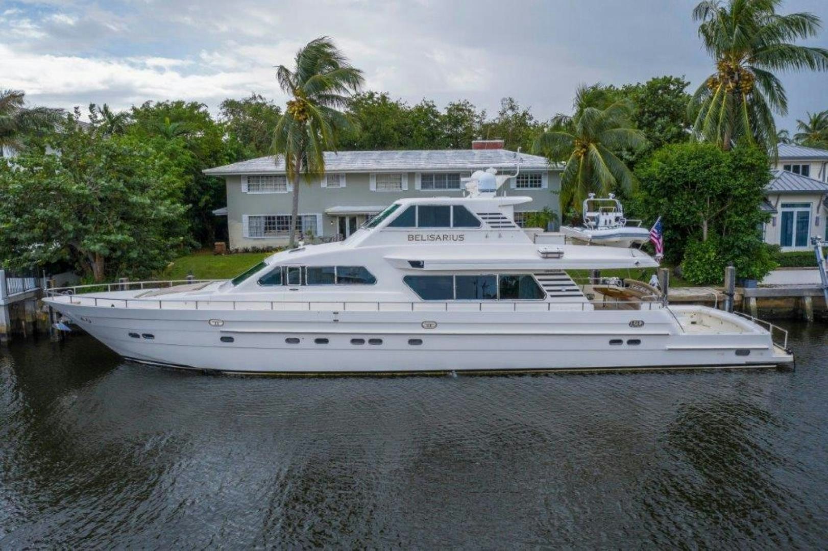 a white boat on a body of water aboard BELISARIUS Yacht for Sale