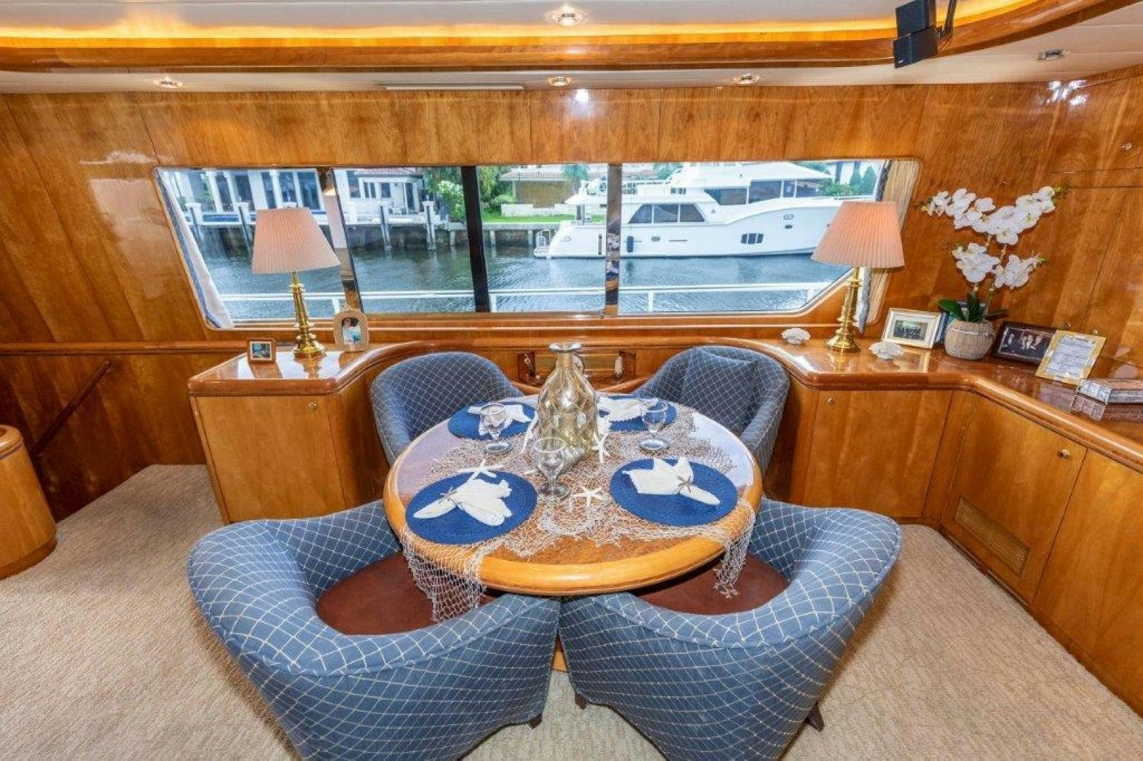 a room with a table and a chair aboard BELISARIUS Yacht for Sale