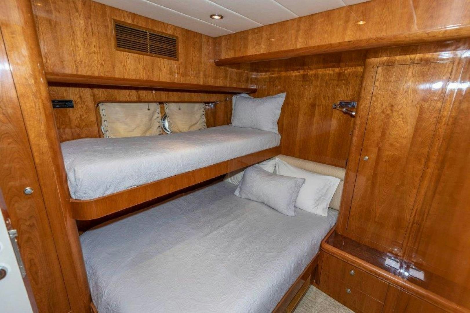 a bed in a room aboard BELISARIUS Yacht for Sale