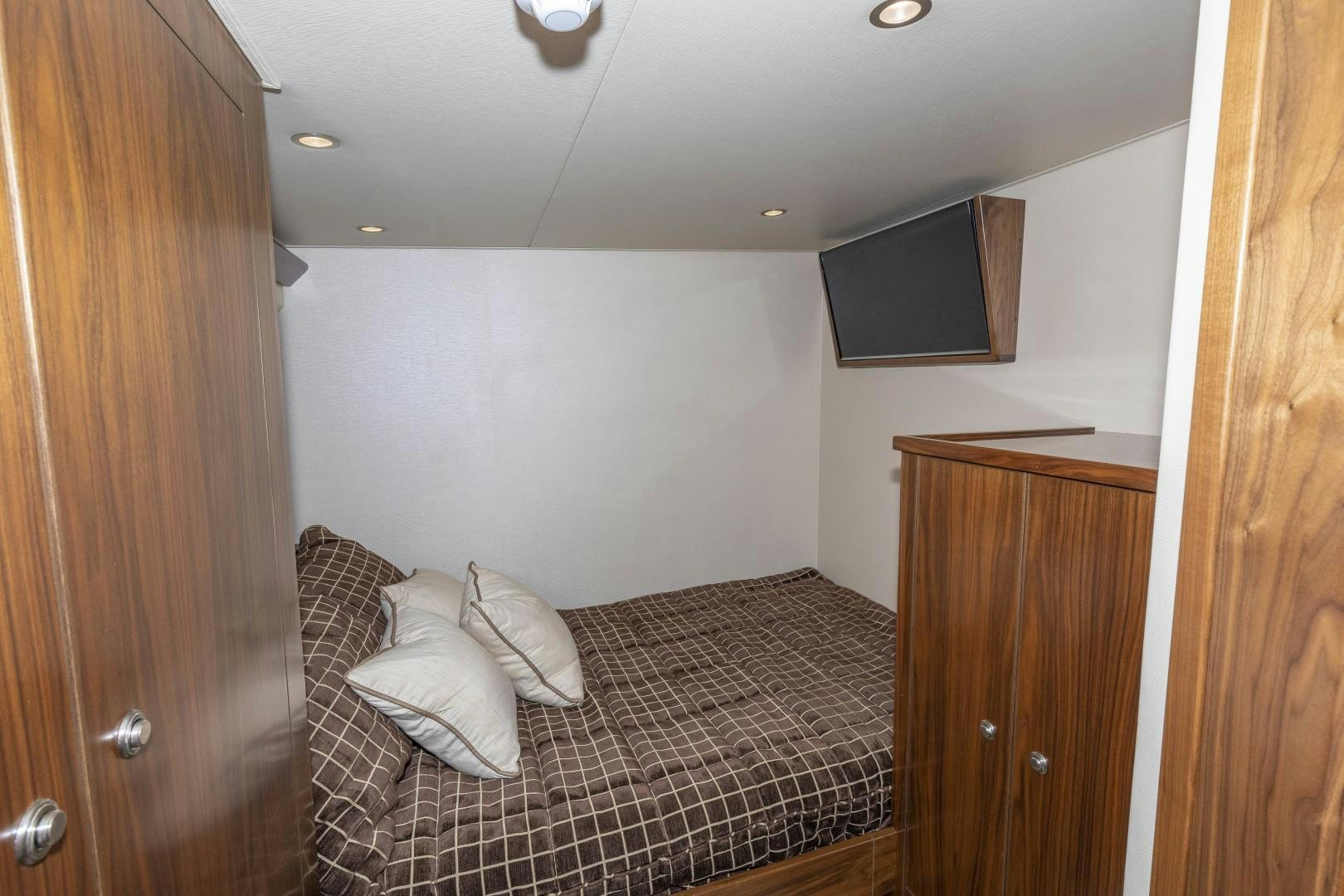 a bed in a room aboard BELLA DONA DI Yacht for Sale