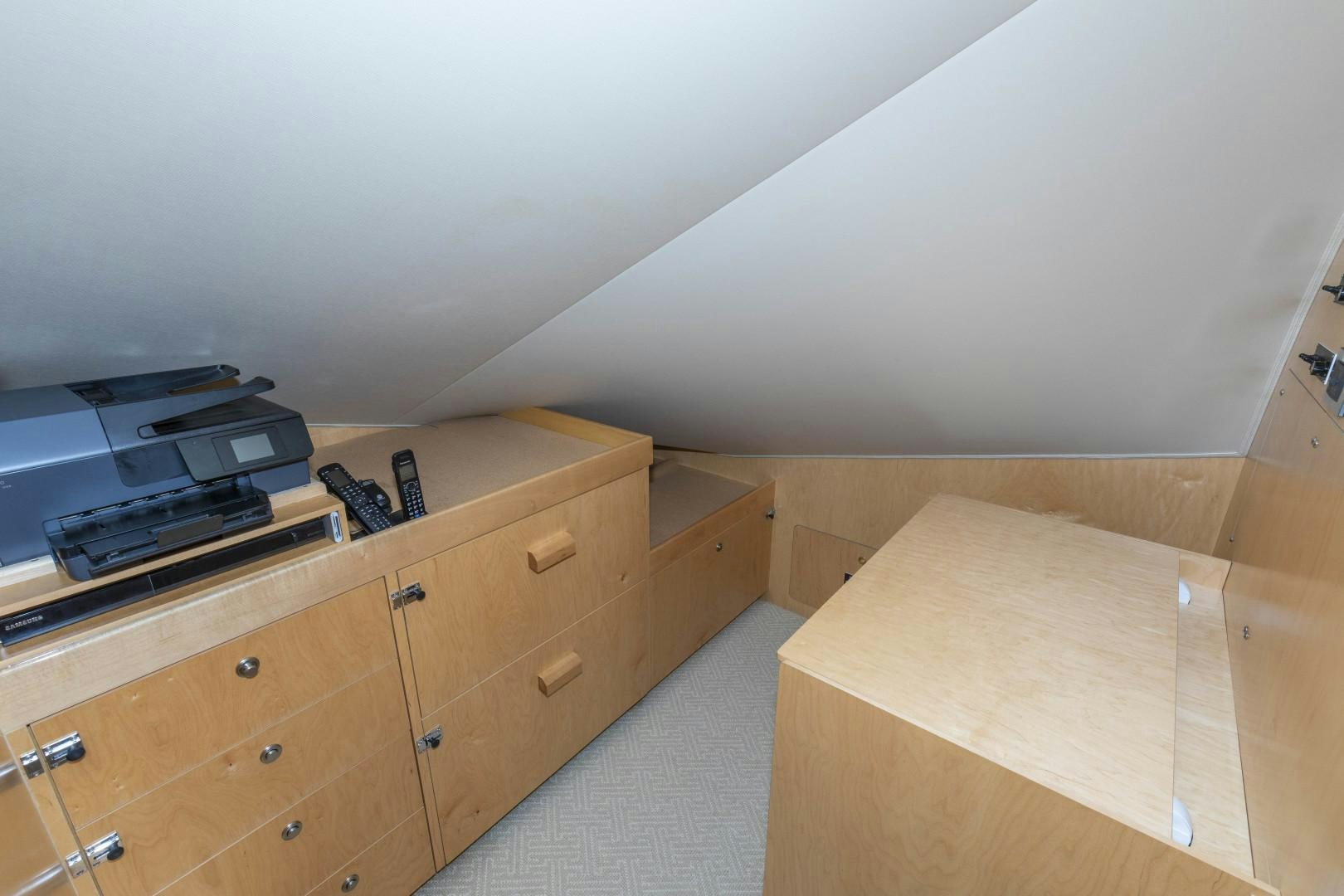 a room with a printer and a wood cabinet aboard BELLA DONA DI Yacht for Sale
