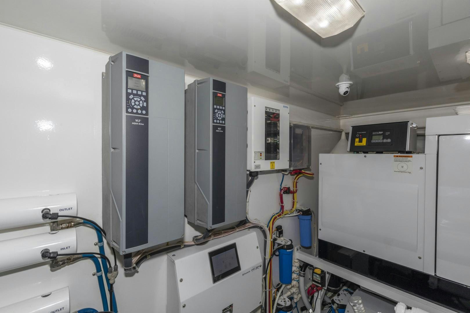 a room with machines and equipment aboard BELLA DONA DI Yacht for Sale