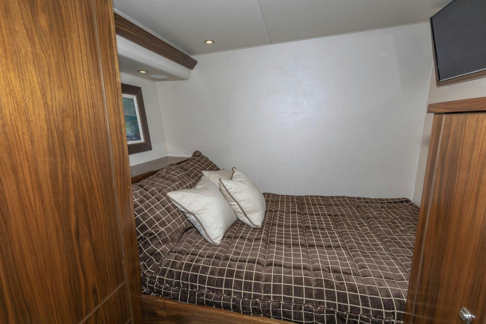 a bed in a room aboard BELLA DONA DI Yacht for Sale