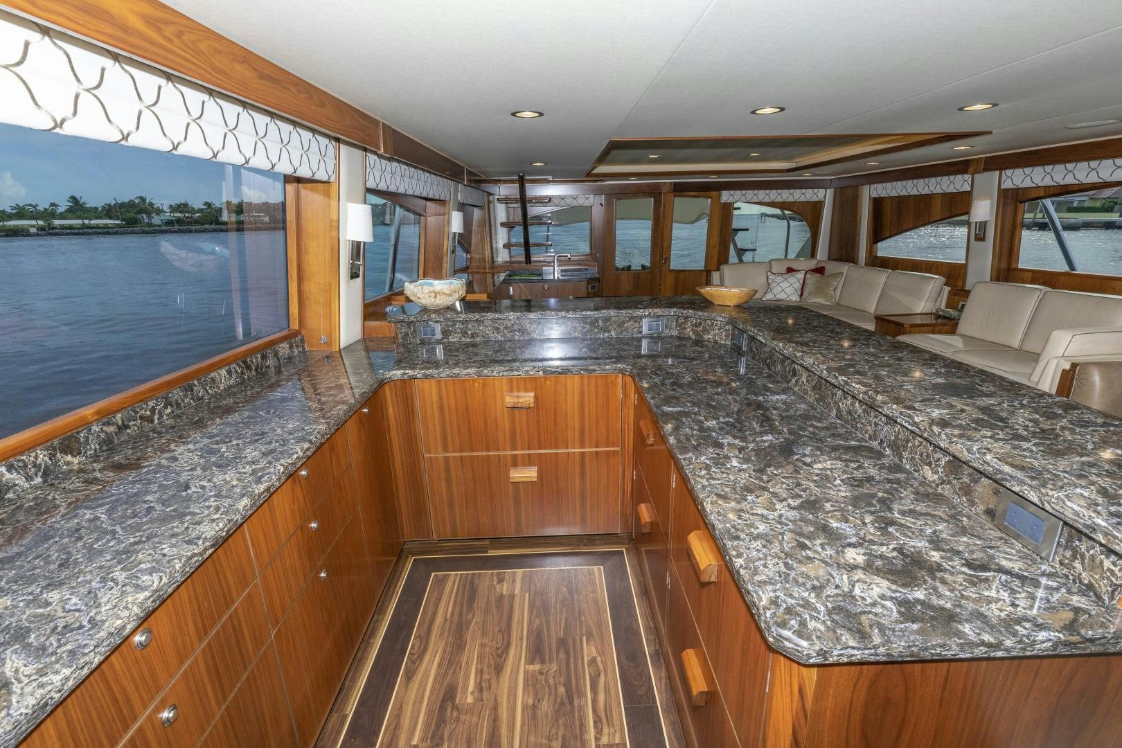a large kitchen with a large island aboard BELLA DONA DI Yacht for Sale