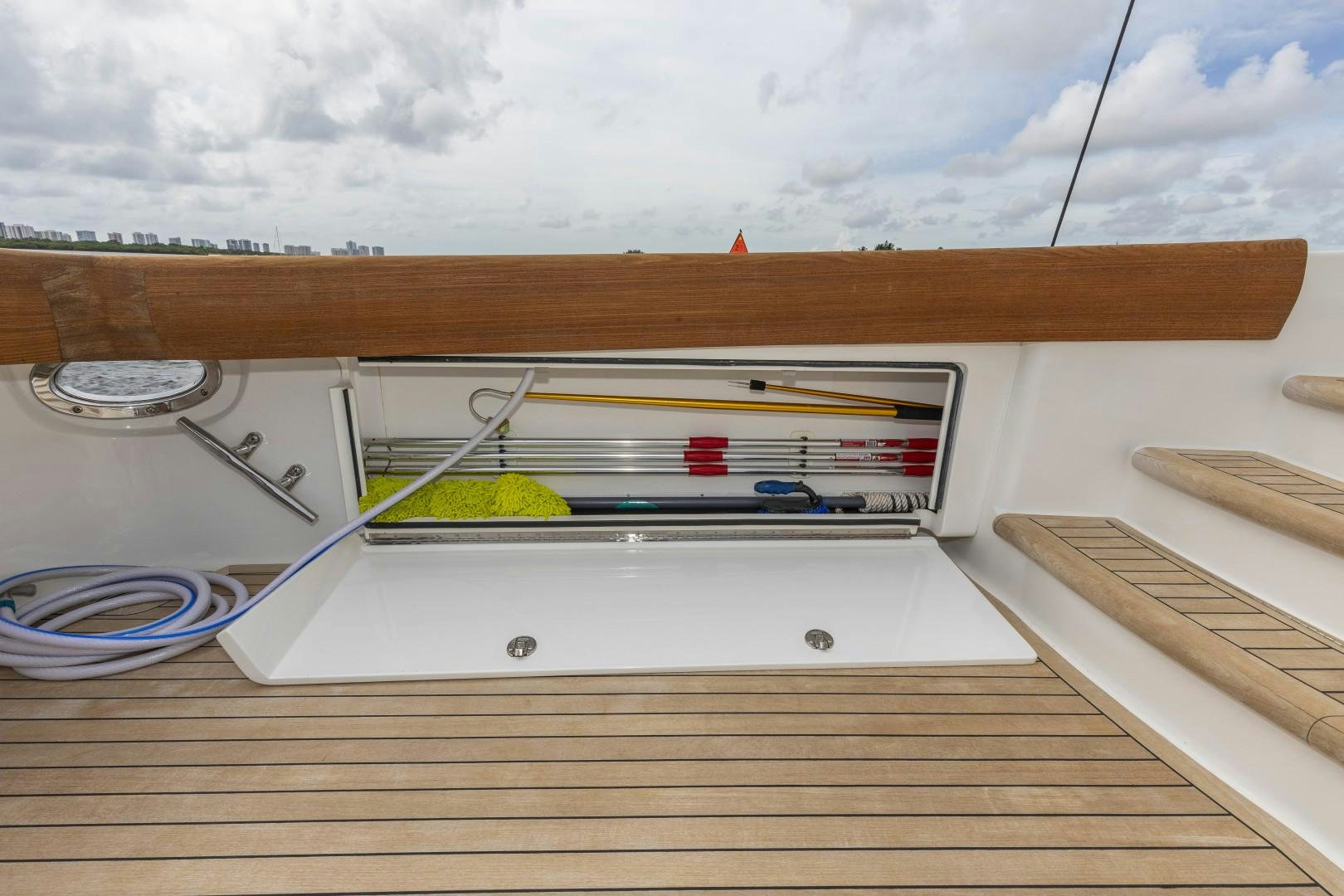 a wooden shelf with wires aboard BELLA DONA DI Yacht for Sale