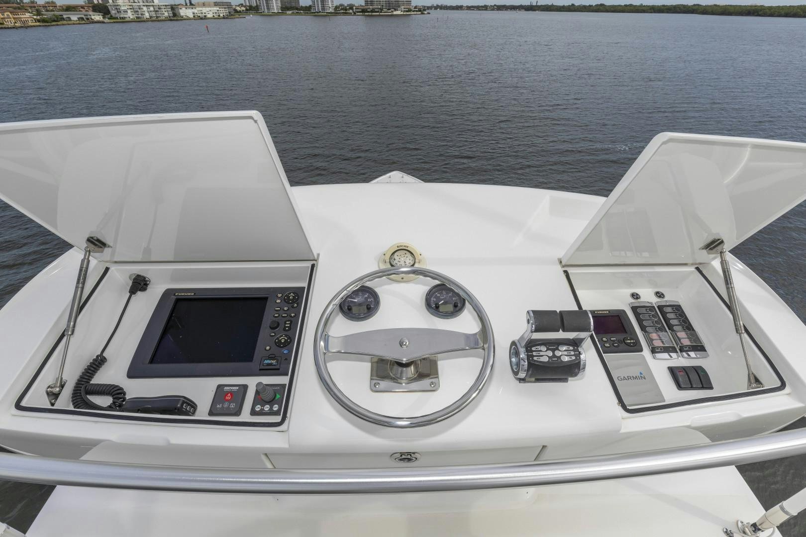 a boat with a steering wheel aboard BELLA DONA DI Yacht for Sale