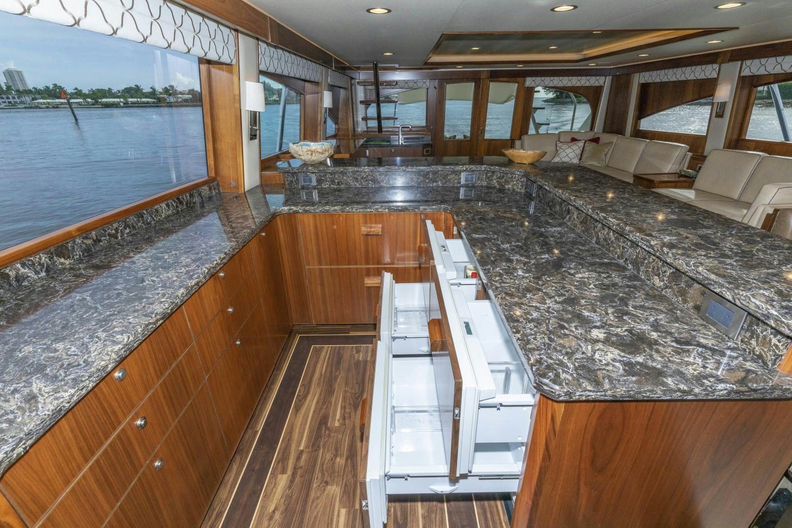 a large kitchen with a large island aboard BELLA DONA DI Yacht for Sale