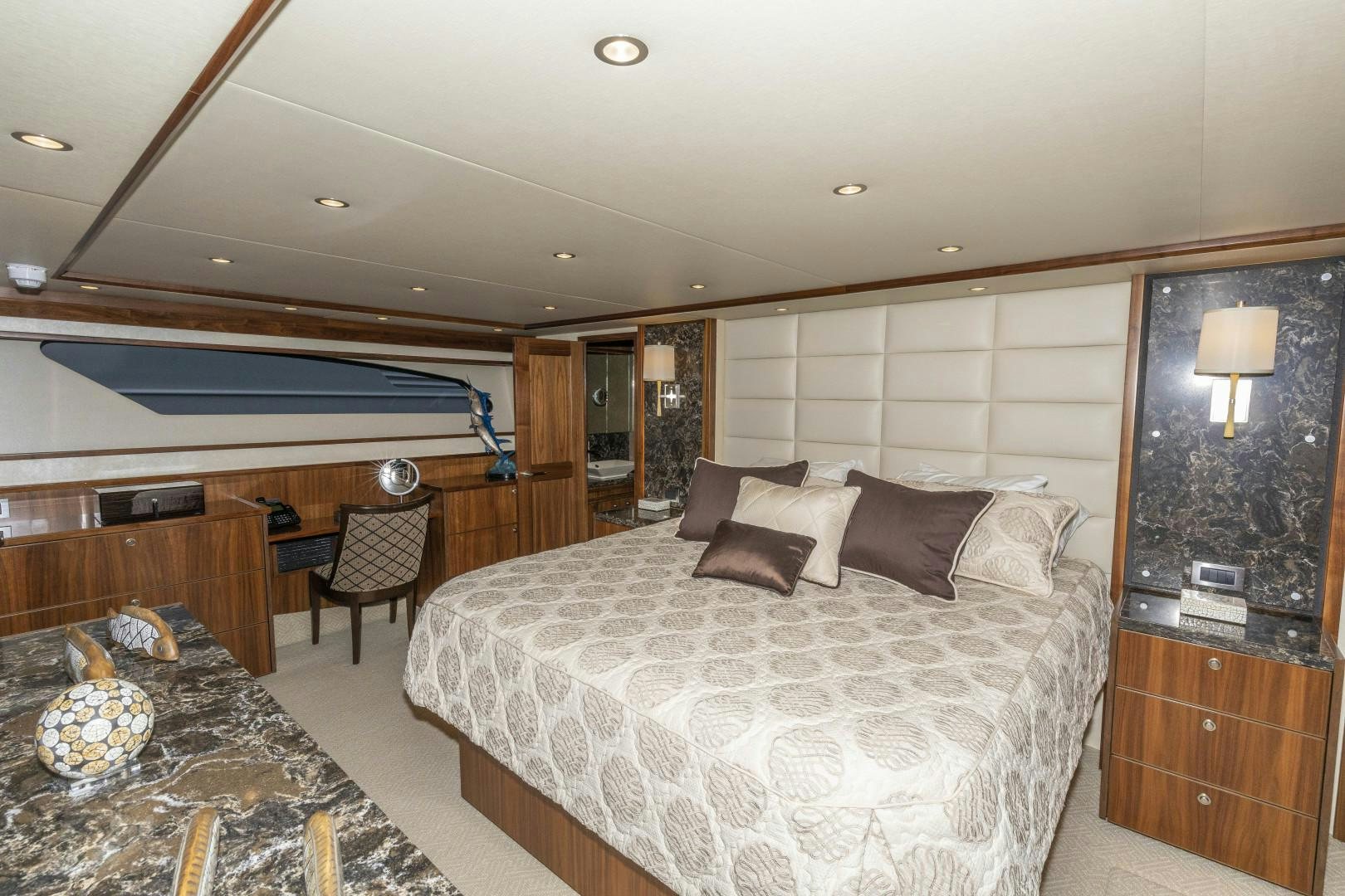 a large bedroom with a large bed aboard BELLA DONA DI Yacht for Sale