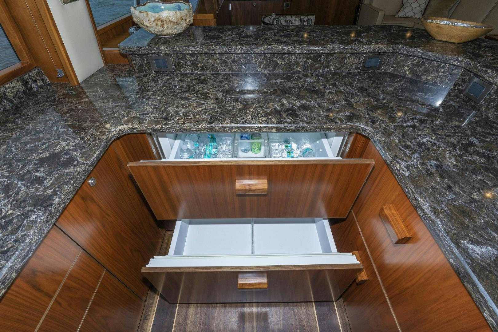 a kitchen with a marble counter top aboard BELLA DONA DI Yacht for Sale