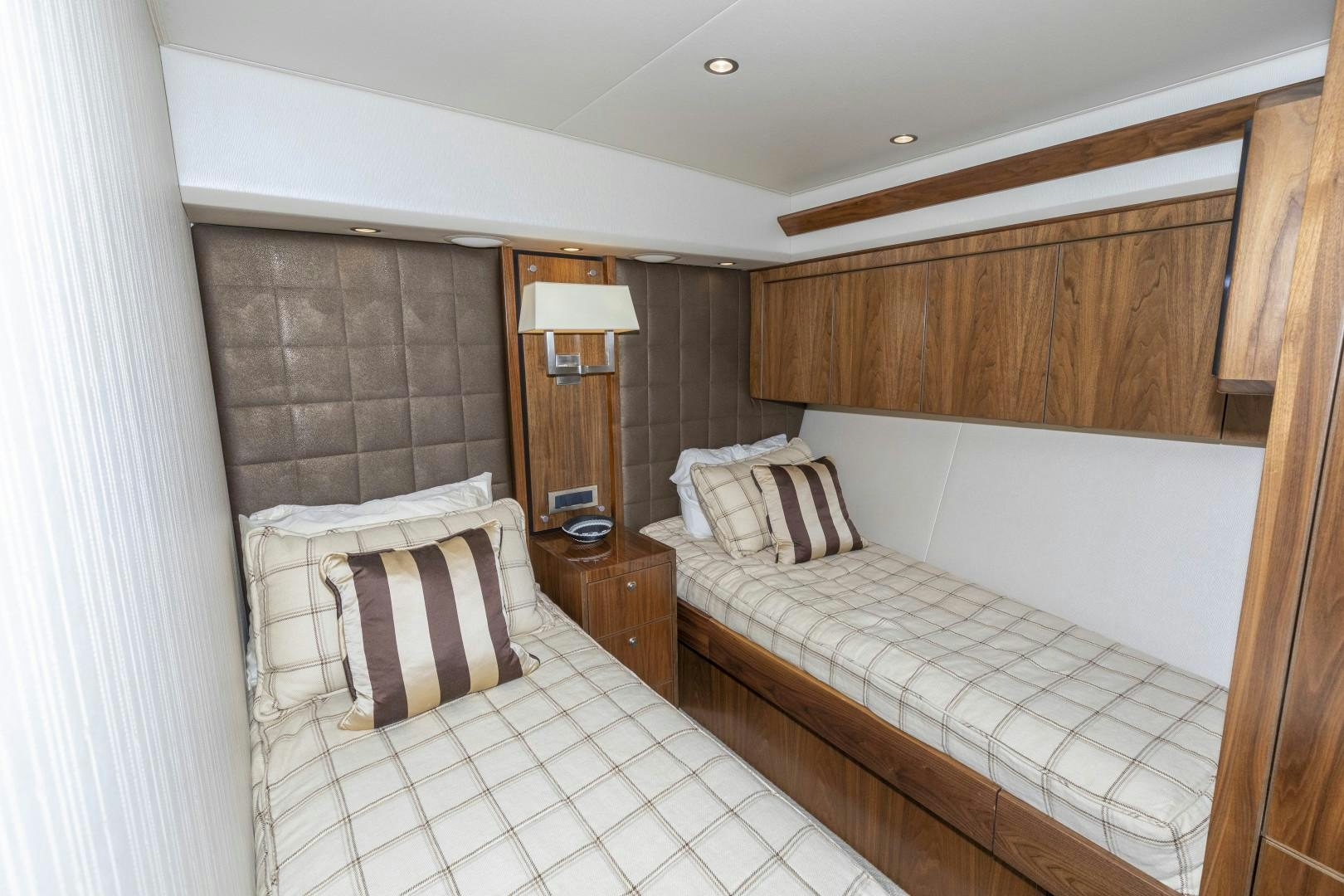 a room with two beds aboard BELLA DONA DI Yacht for Sale